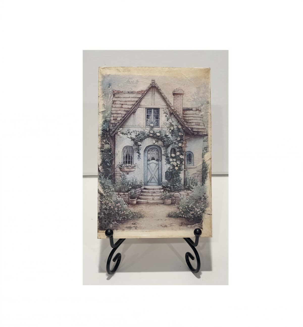 a charming cottage with a quaint porch, surrounded by lush greenery and flowers, creating a serene and picturesque scene.