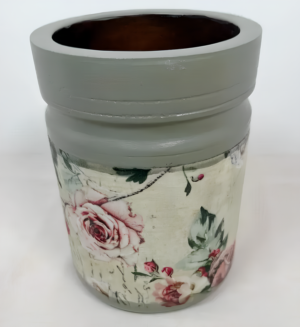 a vase with a floral pattern on its surface.