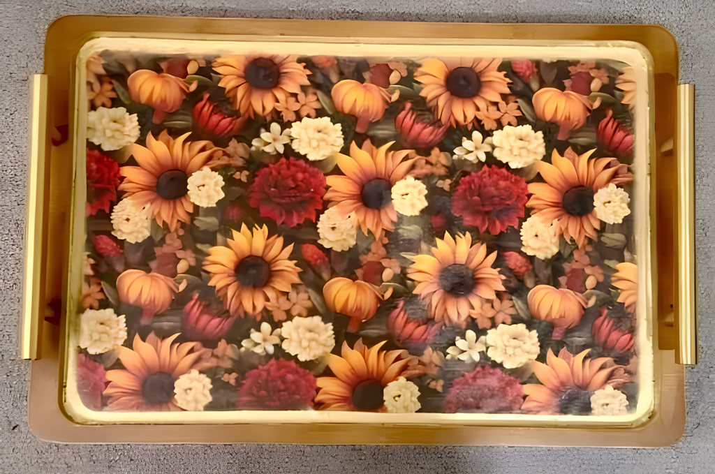 a decorative tray with a floral pattern of sunflowers and other autumn-themed flowers.