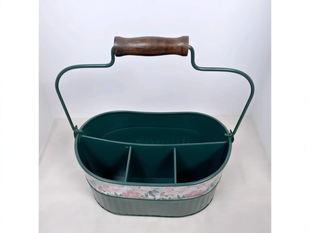 A green metal basket with a wooden handle, designed to hold small items or objects.