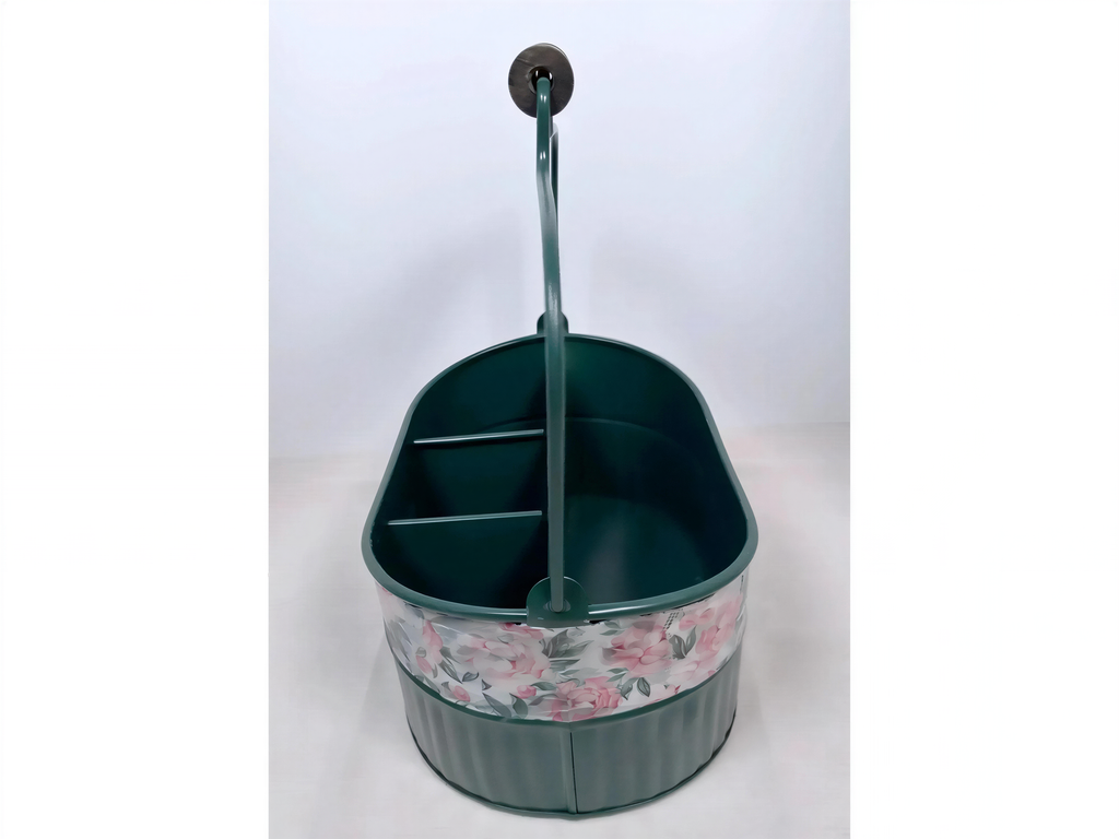 A green metal bucket with a floral pattern on the side, standing upright against a white background.