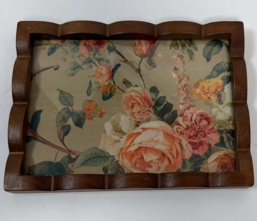 a wooden frame with a floral pattern on the inside, showcasing a variety of colorful flowers.